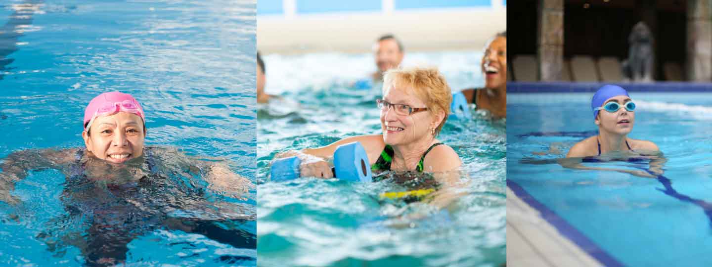 Ladies swimming and doing aerobics in the swimming pool.