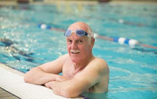 Charles who has osteoarthritis in swimming pool