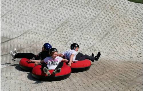 Sarah, Cammy and Soumaya on inflatable ring