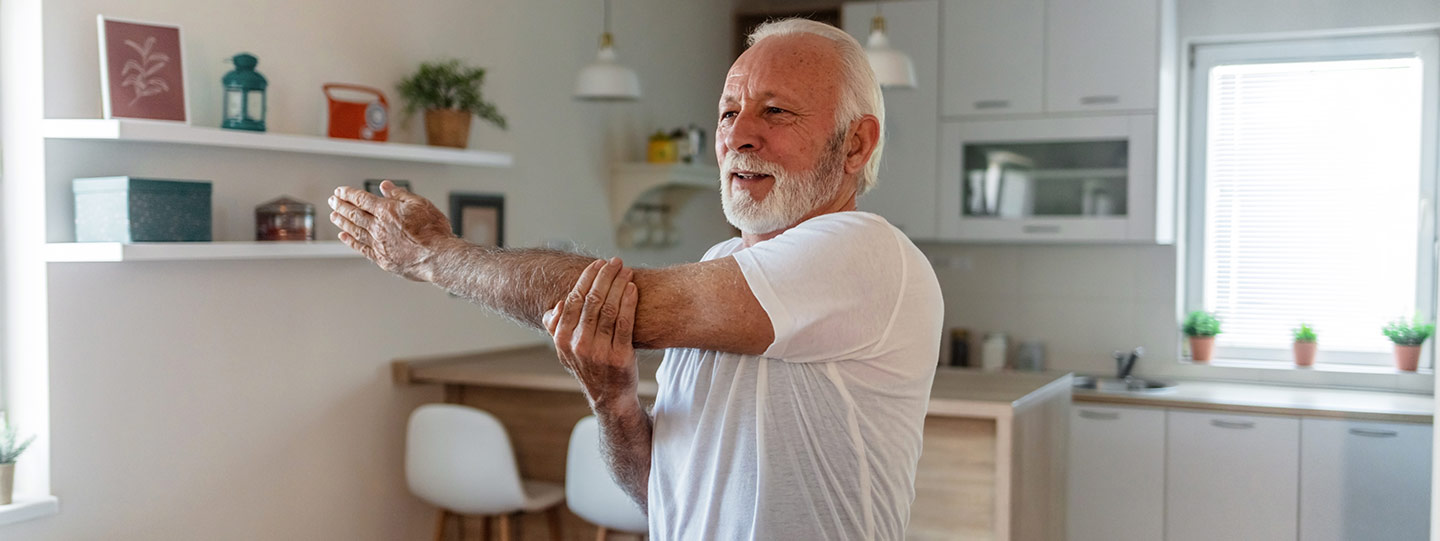 Man stretching as exercise