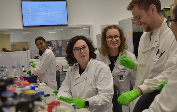 Scientists enjoying a joke while researching