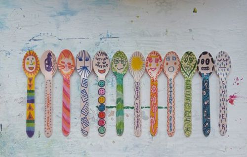 12 decorated wooden spoons in vibrant colours