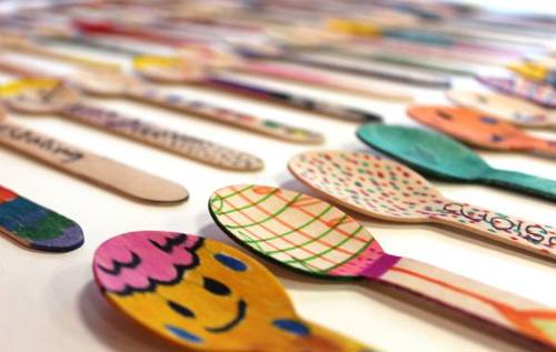 Close-up of colourful decorated spoons